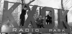 KXOK dj's on the Radio Park sign